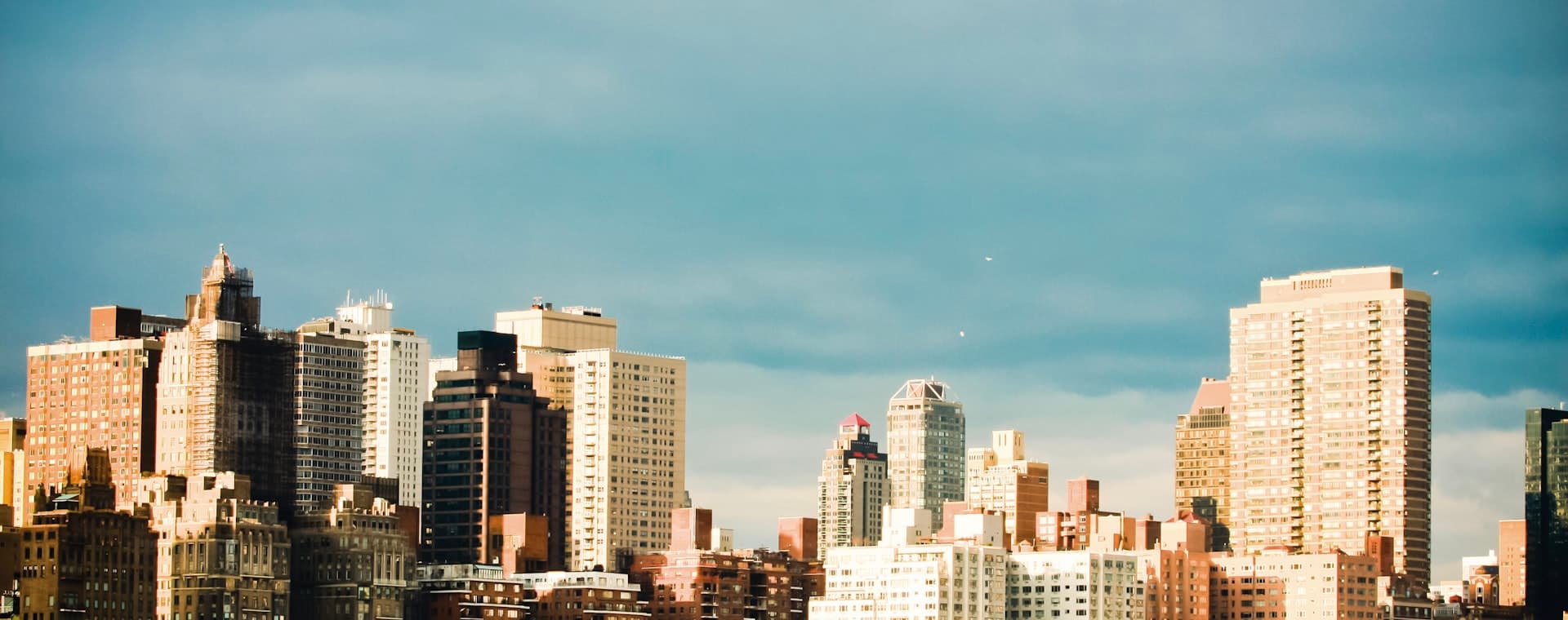 A modern city skyline representing the industries we serve